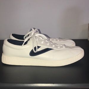 White and blue casual sneakers by Tretorn